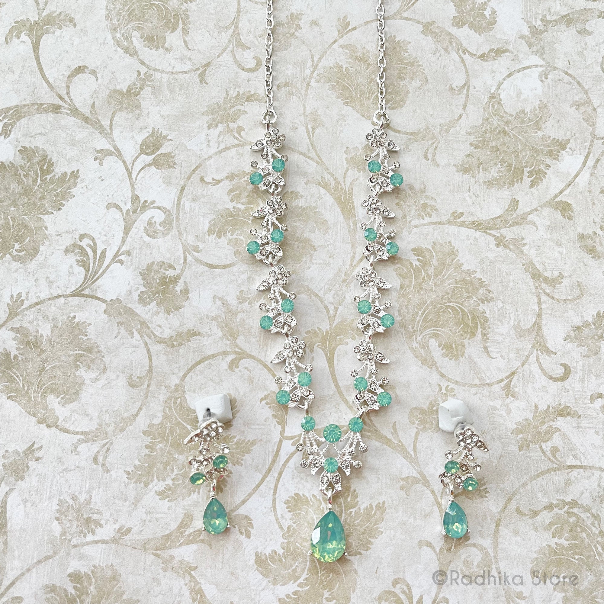 Vrindavan Dew Drops-Rhinestone Deity Necklace And Earring Set- Sea Green