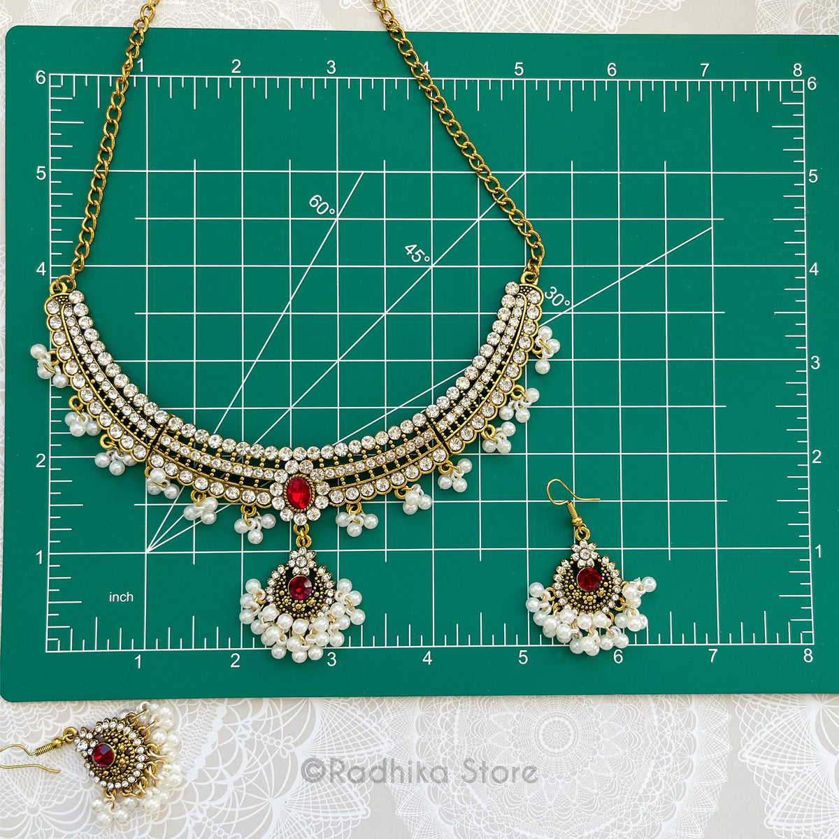 Pearl Jhumka With Ruby- Deity Necklace And Earring Set
