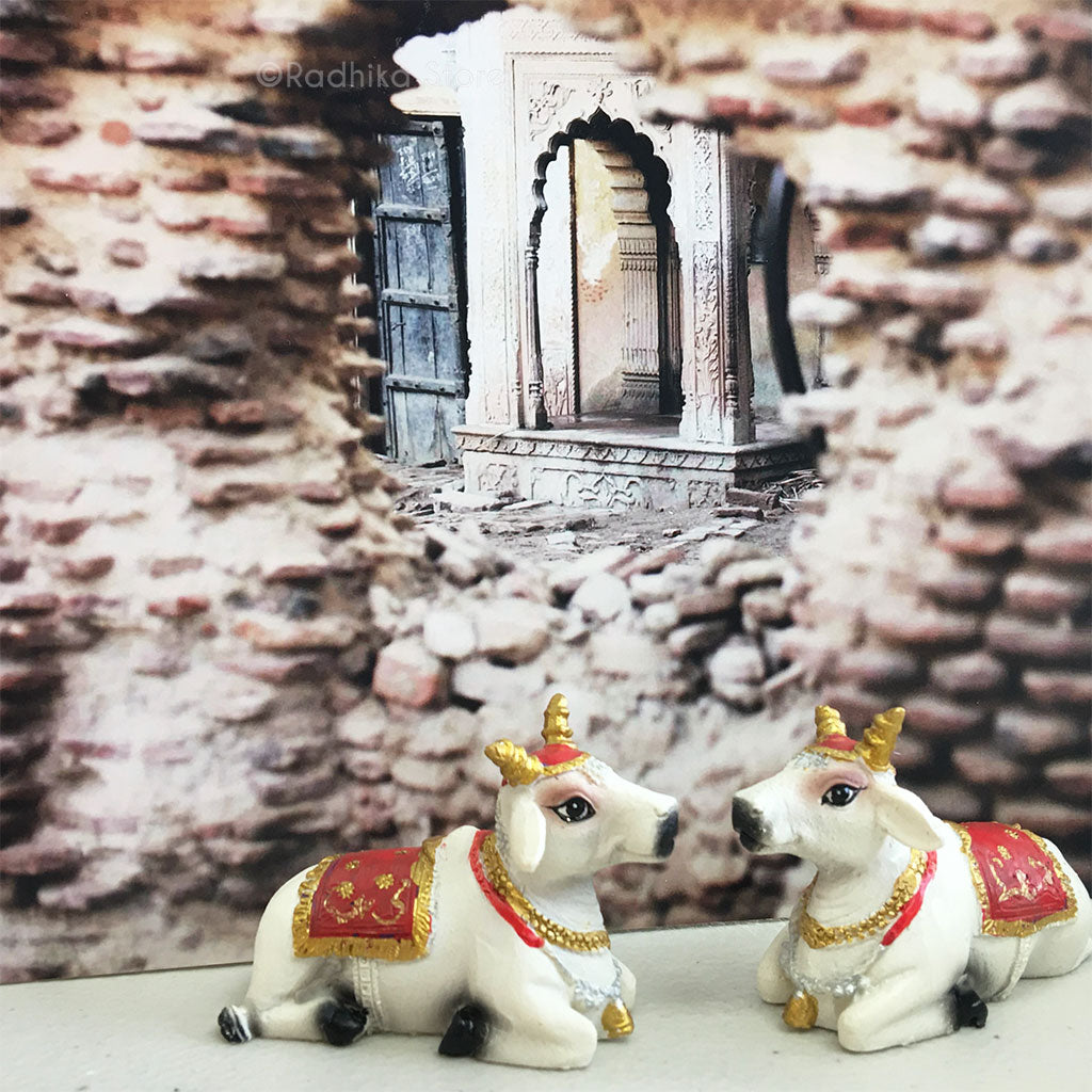 Small Surabhi Altar Cows One Red and one Purple Set  Sitting 2&quot; Inches